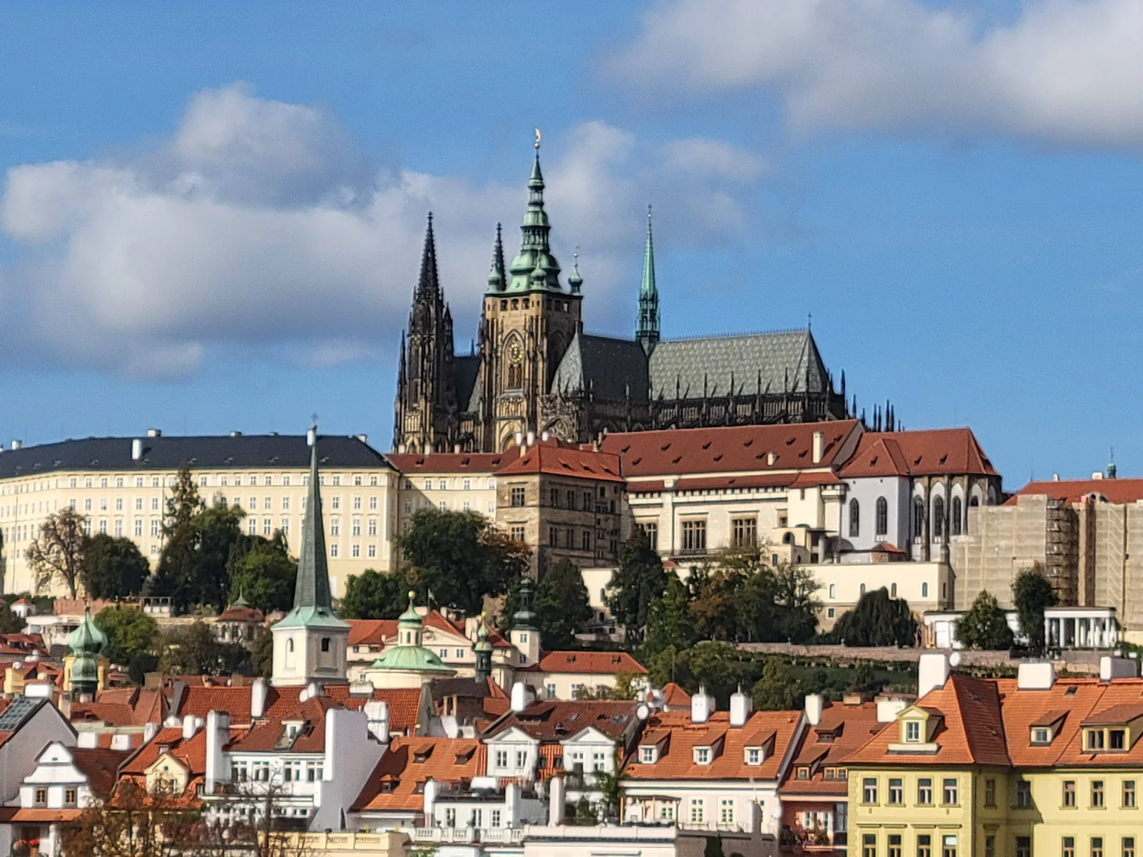 Castle spires above a European skyline