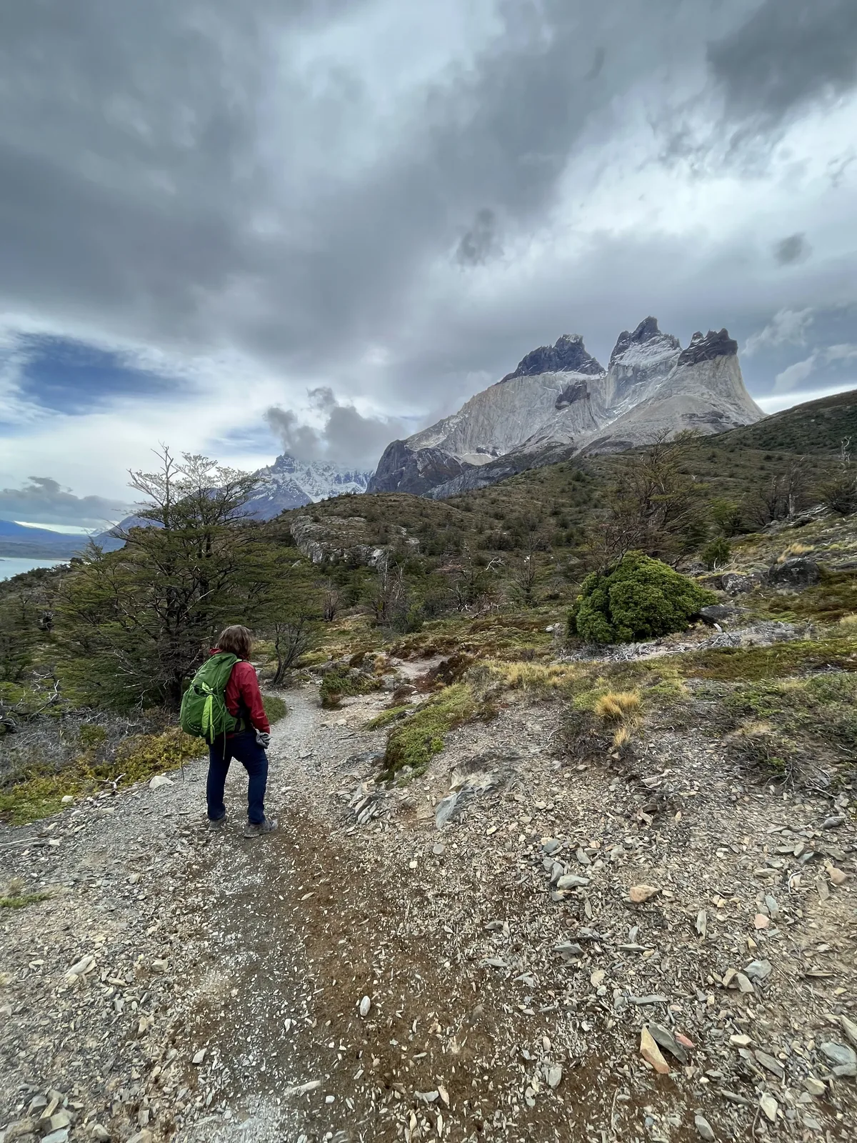 Glacier peaks rising behind a turquoise lake