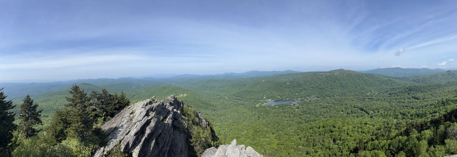 Dramatic mountain ridge overlooking a lake far below