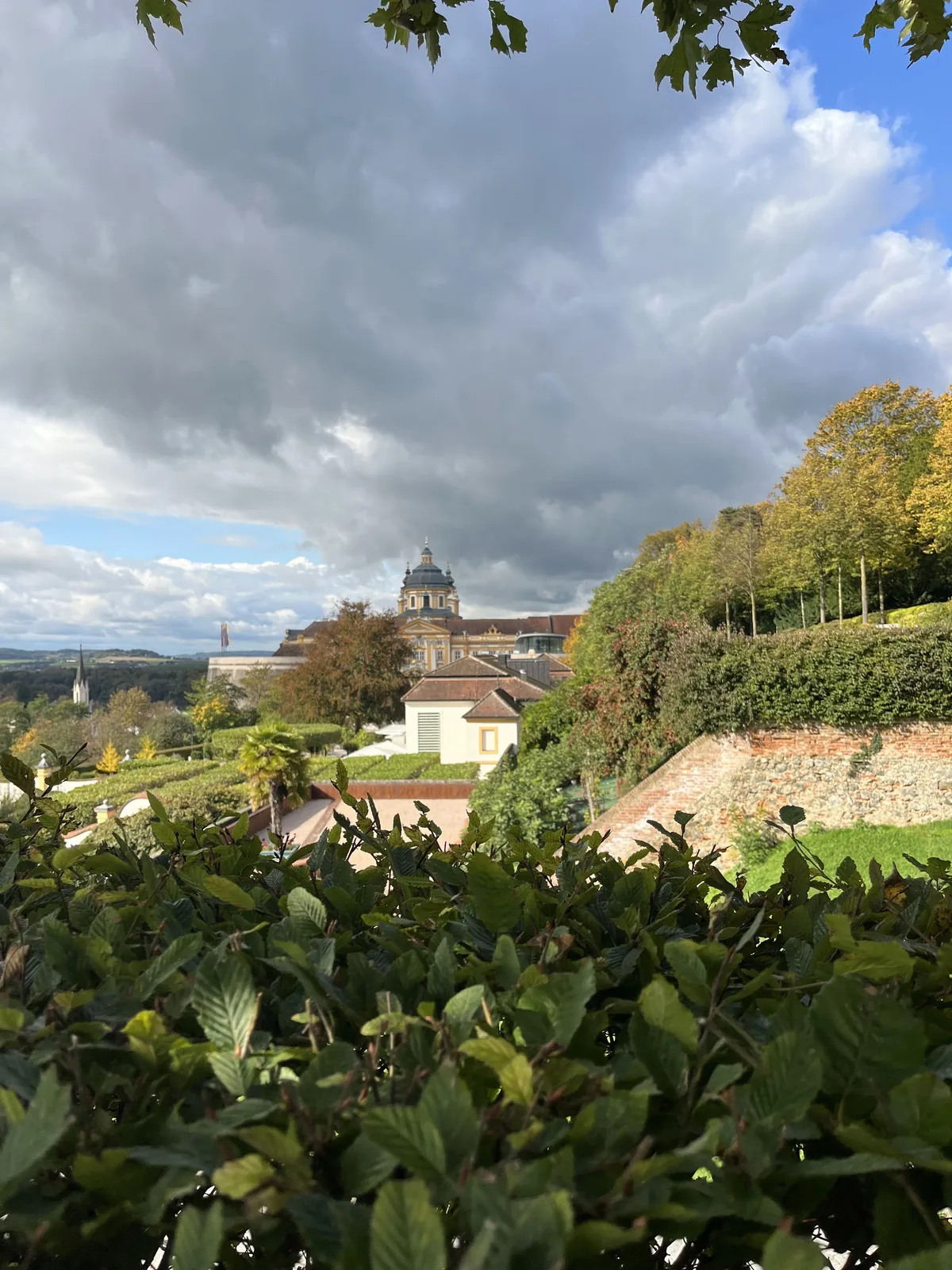 Ruined manor rising from a green lawn