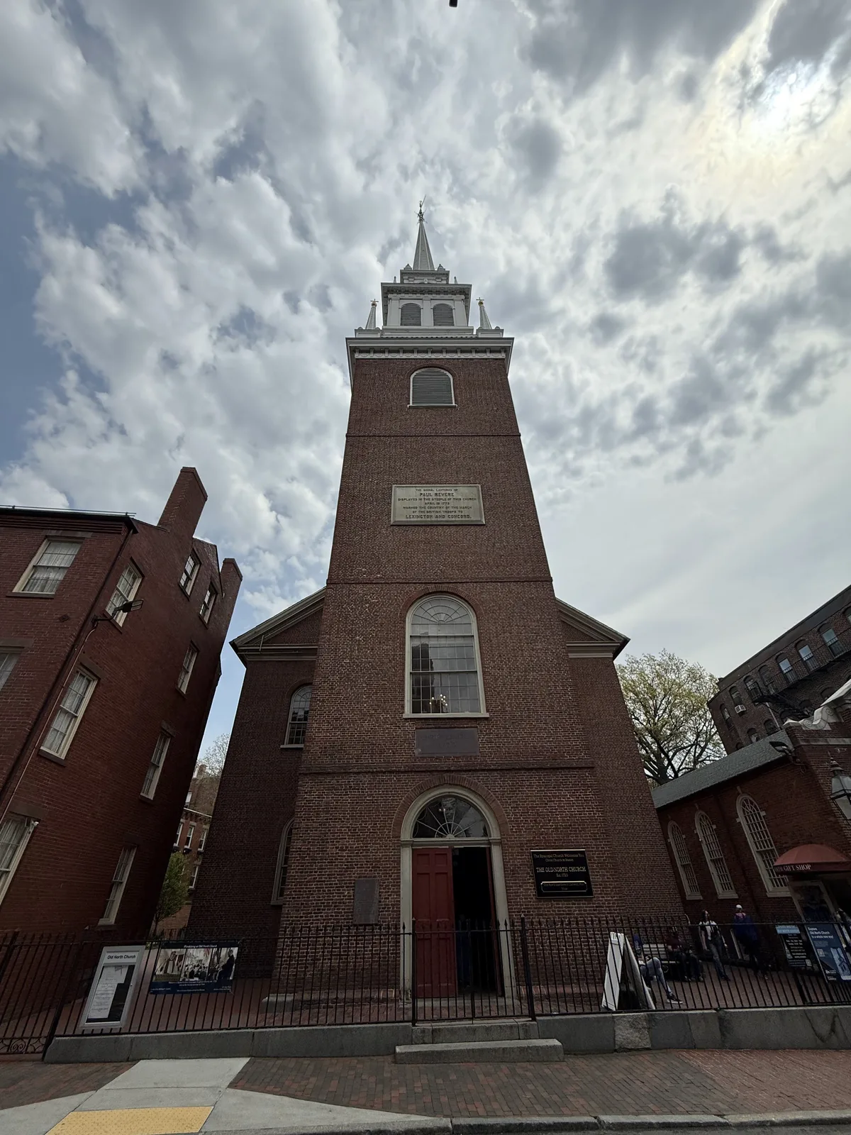 Historic stone abbey beneath gray skies