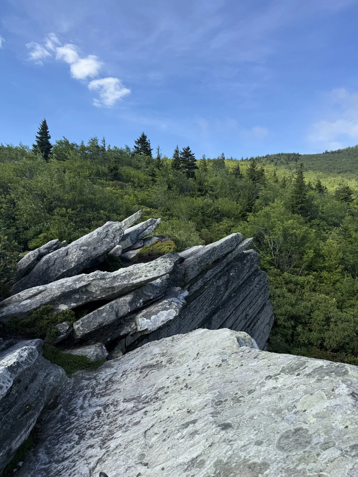 Mountain overlook with dramatic layered clouds