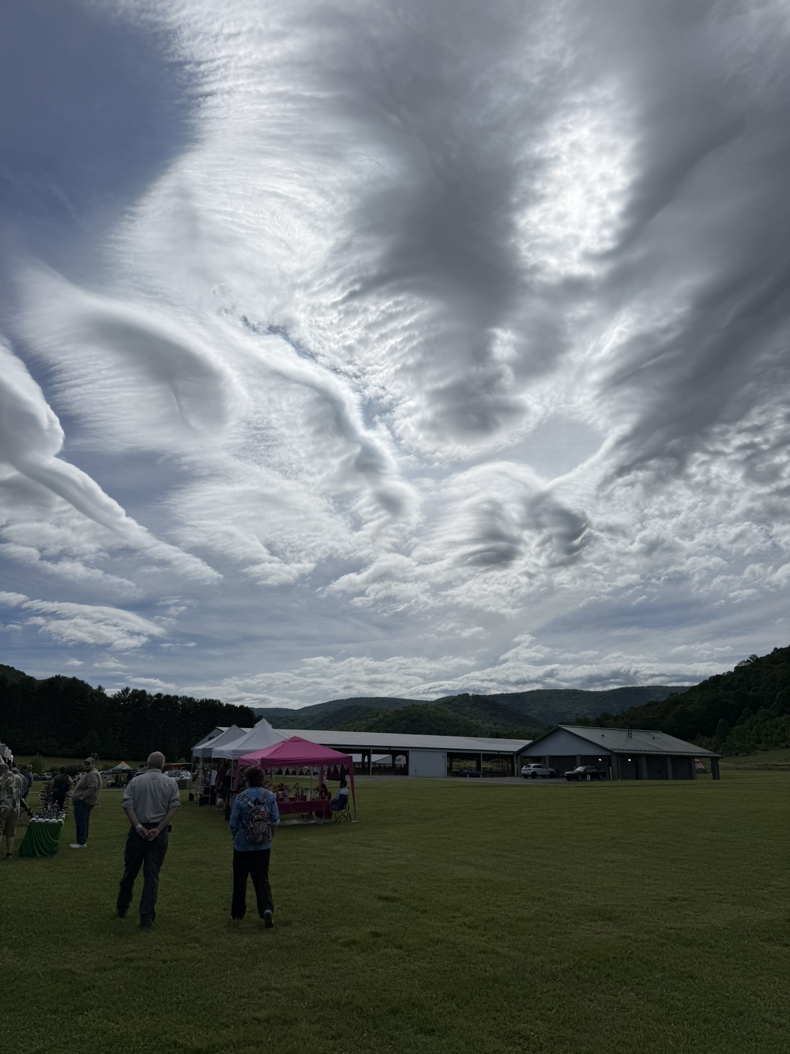 The West Virginia festival field beneath dramatic clouds.