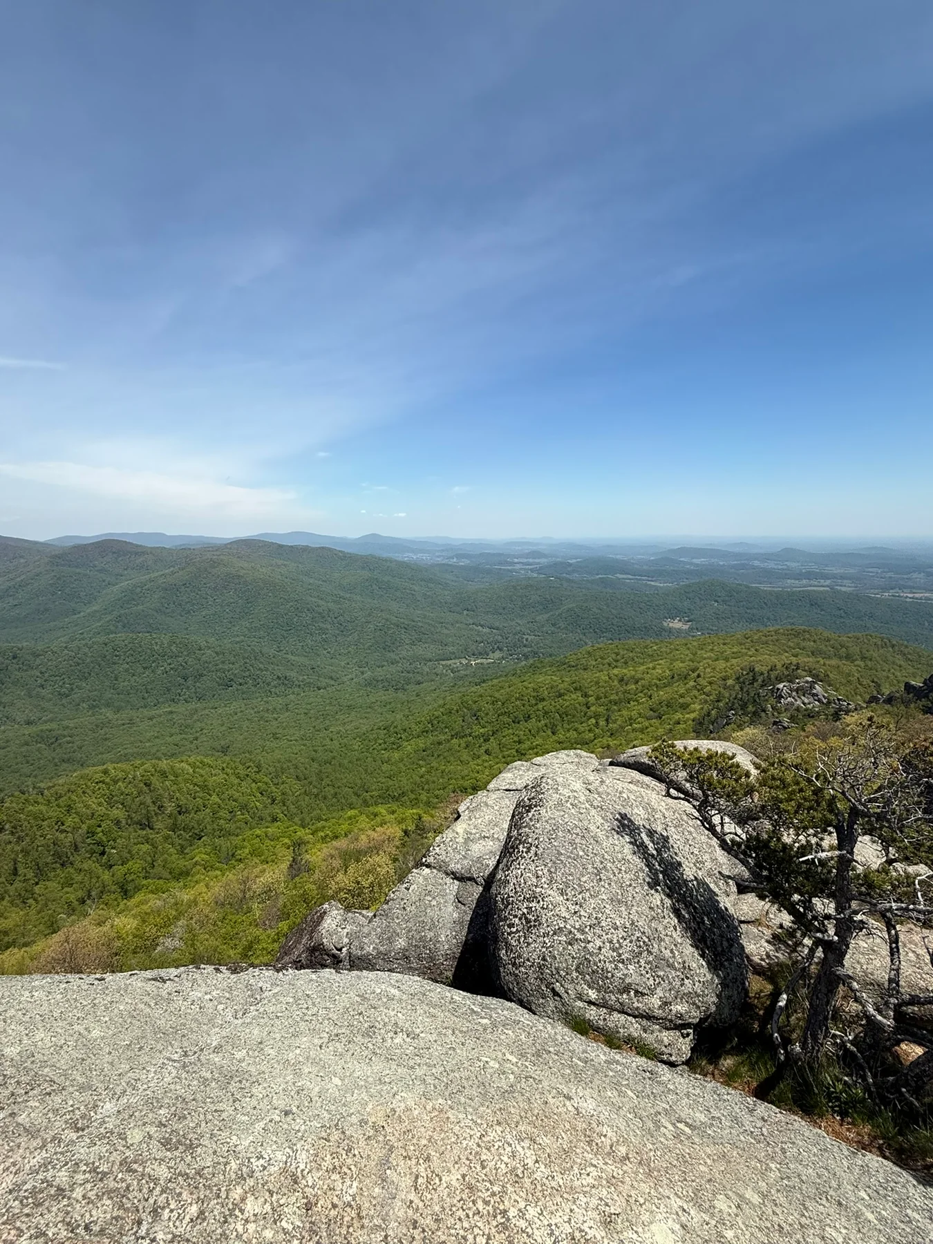 Large rocks and open mountain views from an Old Rag overlook in Shenandoah National Park.